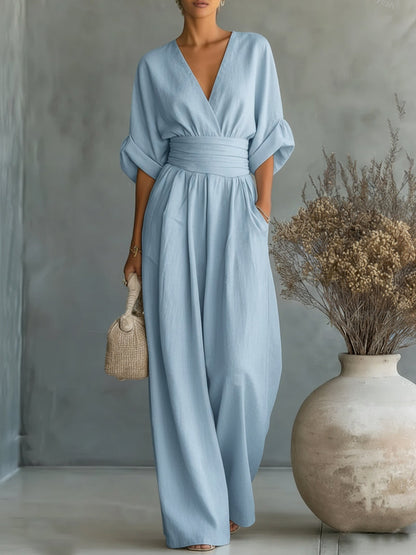 Elegant jumpsuit med V-ringning och hög midja